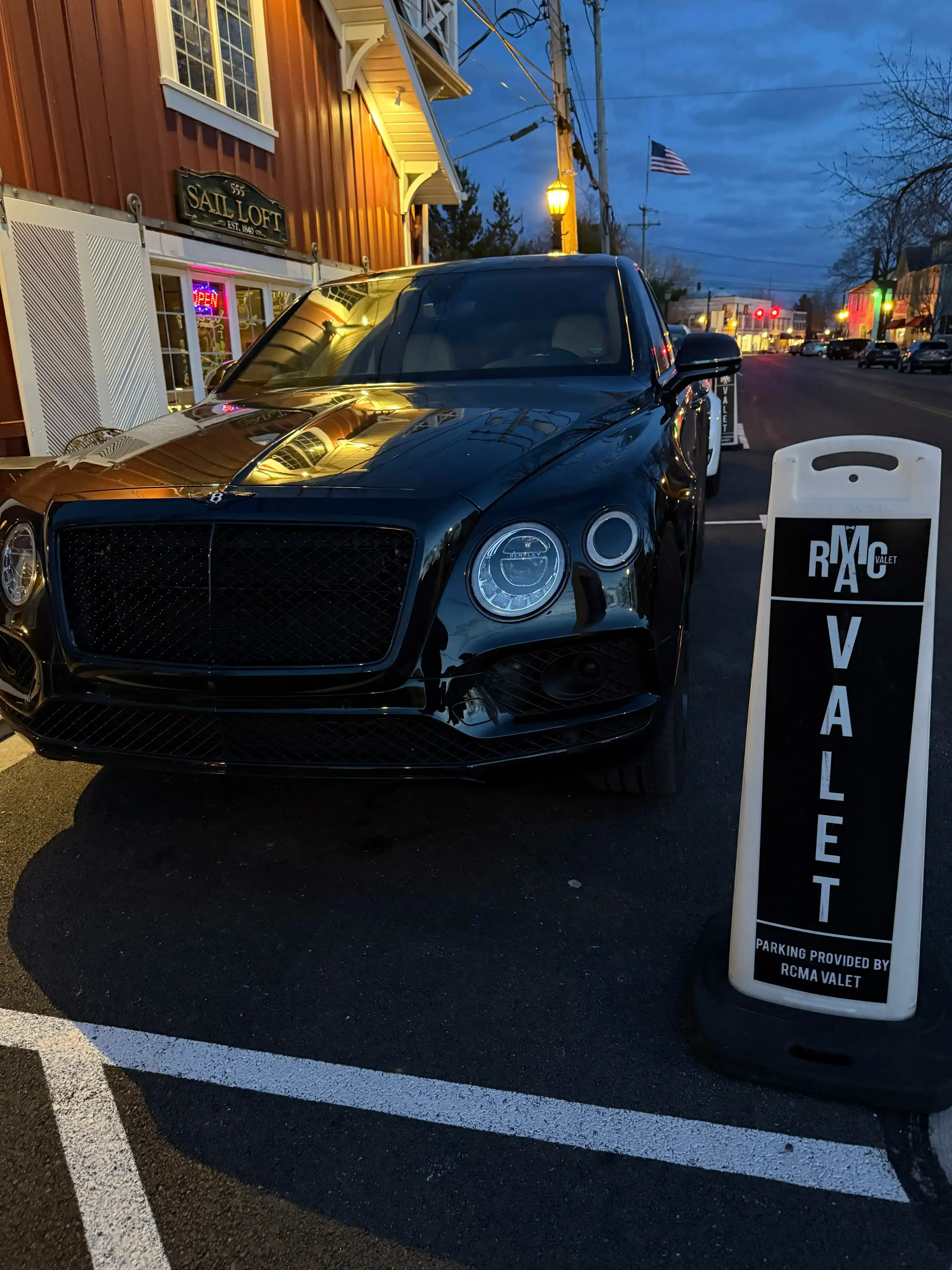 Bentley beside RCMA Valet sign at Chez Francois and Touche Bistro in Vermilion, Ohio