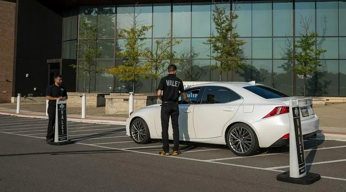 RCMA Valet private event lane with illuminated markers at night