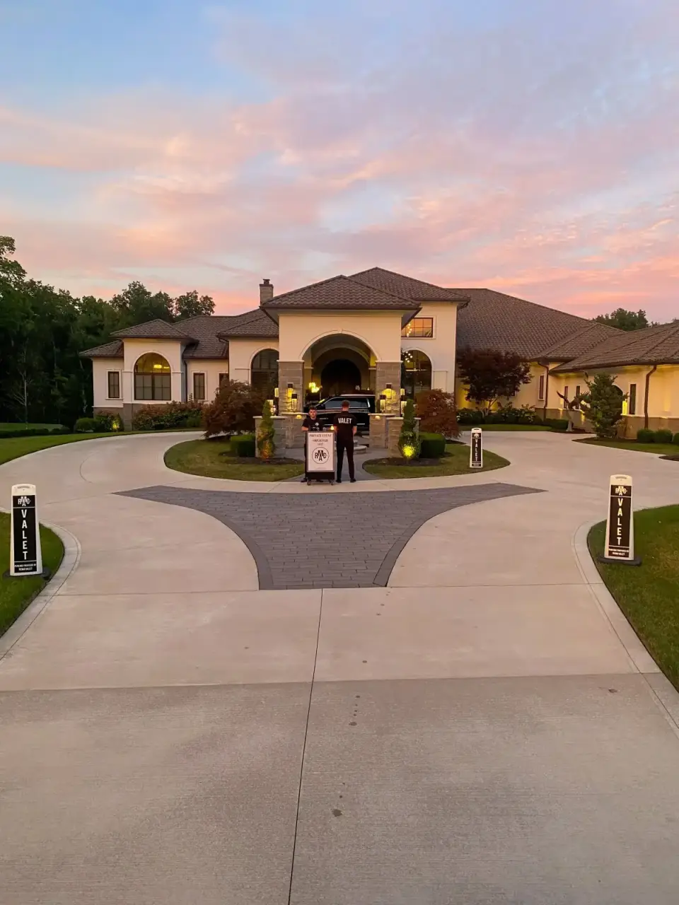 RCMA Valet attendant at a home with a circular driveway